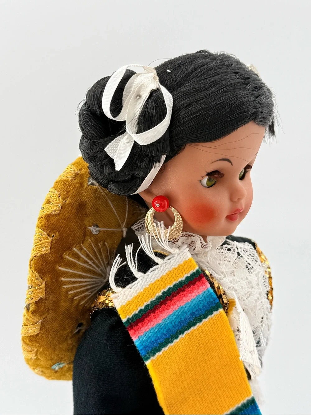 Traditional Black Cloth Doll with Yellow Sash and Lace Accents